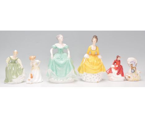 A mixed collection of ceramic figurines to include three Royal Doulton ladies one Emma HN 3208, Coralie HN 2307 and Fair Maid