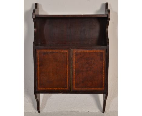 A 19th Century Victorian mahogany wall mounted hanging cabinet having two twin doors with satinwood inlay and lock to front w
