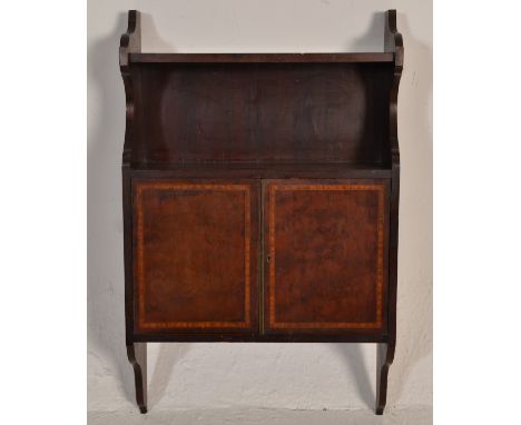 A 19th Century Victorian mahogany wall mounted hanging cabinet having two twin doors with satinwood inlay and lock to front w