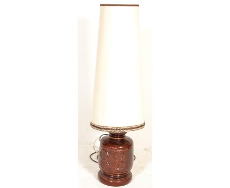 A large mid century West German ' Fat Lava ' floor standing table lamp having pierced bulbous body with a tall tapering cylin