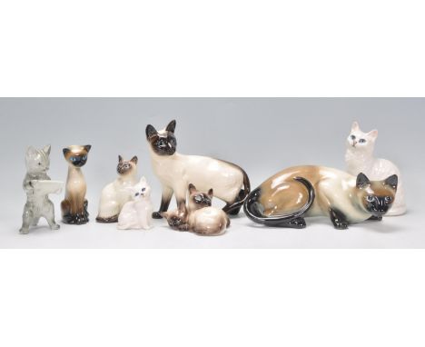 A group vintage 20th Century Beswick ceramic cats to include&nbsp;Siamese cat examples, Persian cats etc. Some being marked B
