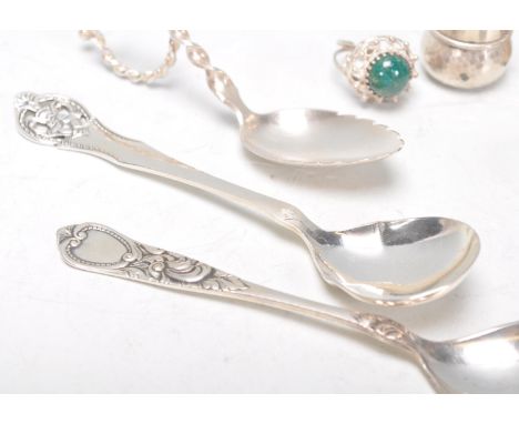 A silver hallmarked Georgian caddy spoon having engraved initials to the handle (hallmarked date letter F with rubbed assay m