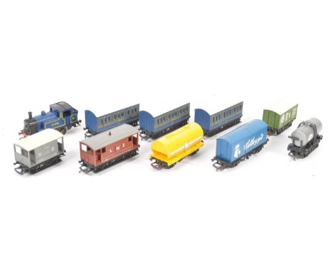 A collection of original vintage Hornby made 00 gauge model railway train set items to include a 0-4-0 7178 tank locomotive e