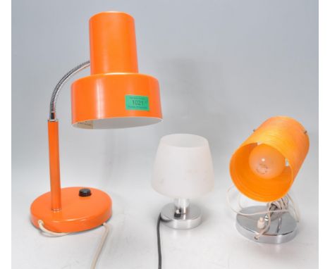 A collection of retro 20th century lights to include a 1970's orange table top spot light, fibr spun woven lamp on shaped arm