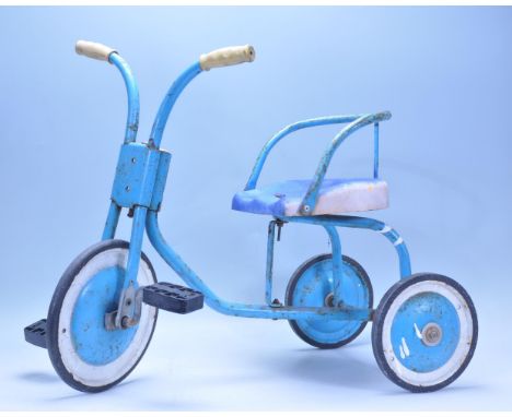 A vintage 1950's tubular metal childs trike&nbsp; in the original blue colourway with pedals and original wheels.