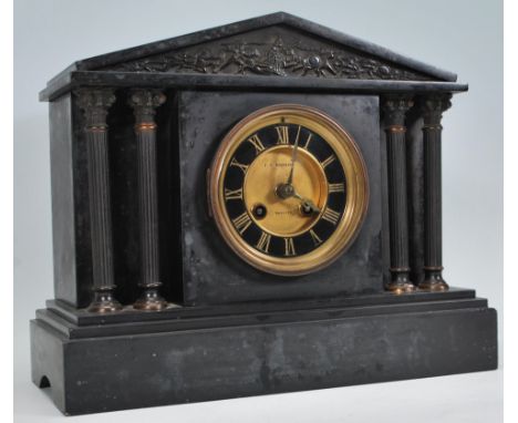 A Victorian 19th century marble &amp; slate mantel clock. Inset brass 8 day movement with gilded chapter ring and detailing. 
