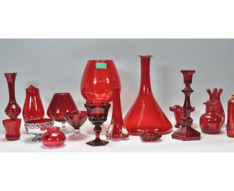 A large collection of mid century retro studio art glass in cranberry, red and ruby flash red comprising goblets, vases, bowl