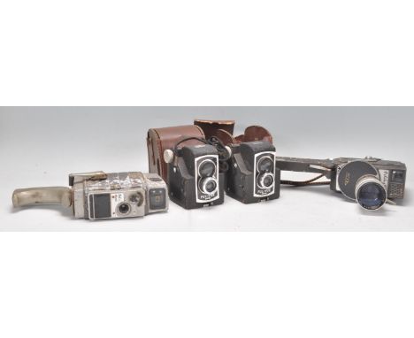 A group of vintage 20th Century cameras to include two Ross Ensign Ful-Vue Super cameras both in original leather cases, a Ho