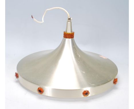 A large mid 20th Century Danish retro vintage UFO aluminium ceiling light fixture having a trumpeted form with orange translu