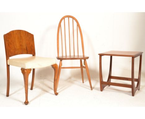 A retro mid century teak wood occasional table with shaped legs together with an Ercol hoop back blond wood dining chair and 