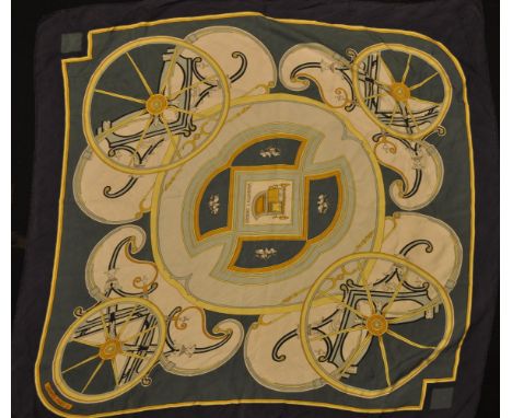 A vintage Hermes ladies silk scarf in the Washington Carriage pattern having a blue ground with a yellow details.&nbsp;