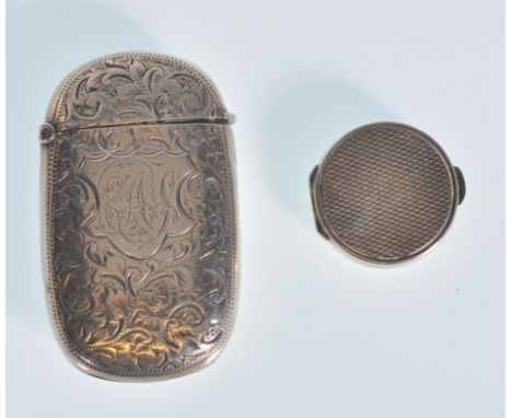 A late 19th Century Victorian silver hallmarked vesta case with finely engraved floral decoration with hinged lid and match s