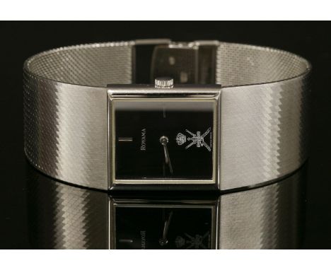 A cased gentlemen's 18ct gold Royama mechanical bracelet watch, c.1980,a rectangular black lacquered dial with raised sword b