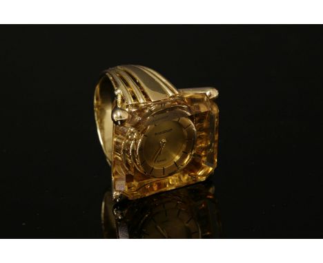 An 18ct gold Jaeger-LeCoultre mechanical citrine ring watch, c.1955,with an octagonal step cut citrine, four claw set to a pi