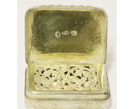 A George III silver-gilt vinaigrette,Matthew Linwood, Birmingham, 1814,rectangular engine-turned with chased foliate borders,