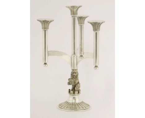 An Elizabeth II three-light parcel-gilt silver candelabra,Aurum Designs, London, 1977 and Hector Miller, London, 1985,the can