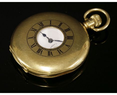 An 18ct gold half hunter Zenith pocket watch,48mm diameter, with a dark blue enamel, Roman numeral, chapter ring to the front