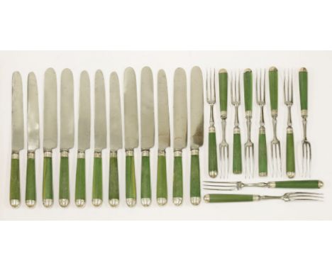 Twelve green-stained ivory knives and ten green-stained ivory forks,late 18th century,the forks with later steel three-tine p