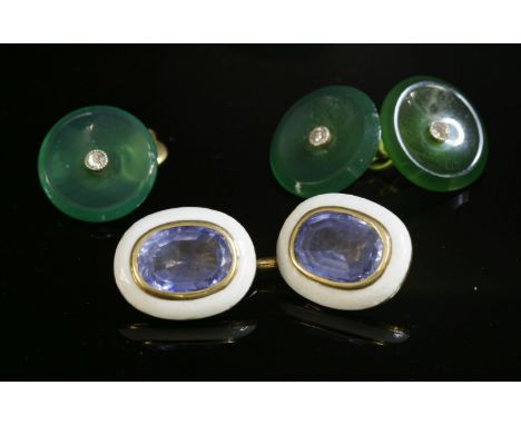 A single sapphire and enamel chain-link cufflink, c.1930,with two oval mixed cut sapphires.  Each rub set in yellow, a border