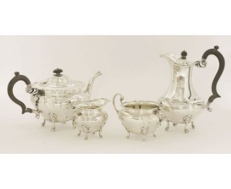 A George V silver four-piece tea service,Charles Clement Pilling for Sibray, Hall & Co., Ltd., Sheffield, 1912, baluster, on 