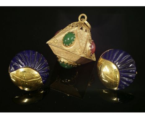 An Italian gold lantern charm pendant, c.1960,of cube form, with paste oval cabochons in red and green, all claw set to trian