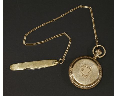 An American gold hunter pocket watch,by American Watch Co., Waltham.  A white enamel dial, 64mm diameter, with black Roman nu