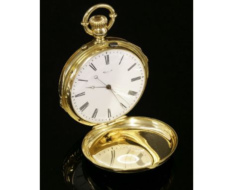 A gold hunter repeater pocket watch, 50mm diameter with a hand engraved coat of arms to the front cover with foliate border a