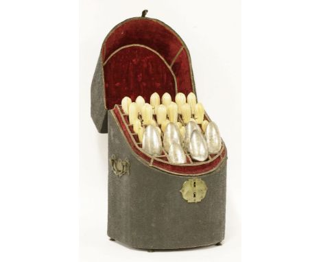 An associated set of twelve knives and twelve forks in associated back fish skin standing box,c.1730,with ivory naturalistic 