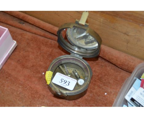 A brass cased compass
