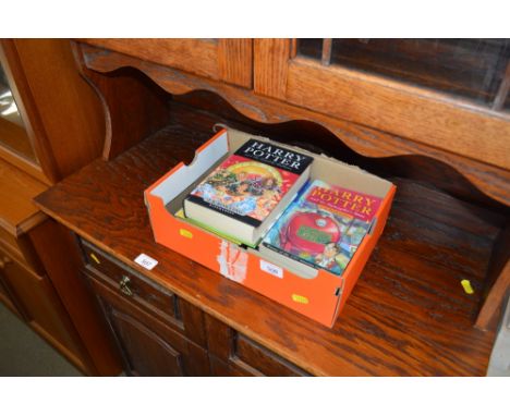 A box of Harry Potter books 