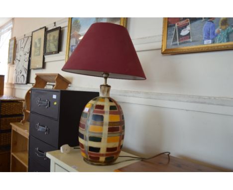 A pottery table lamp