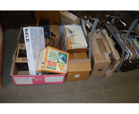 A box containing various light fittings; candle holders; various china; picture frames etc