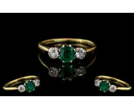 Ladies 18ct Gold and Platinum 3 Stone Diamond and Emerald Set Ring. Marked 18ct and Platinum to Interior of Shank. The Natura