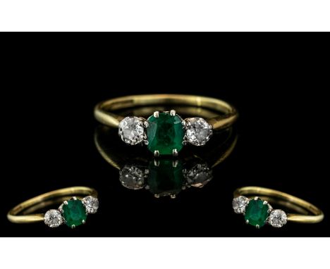 Ladies 18ct Gold and Platinum 3 Stone Diamond and Emerald Set Ring. Marked 18ct and Platinum to Interior of Shank. The Natura