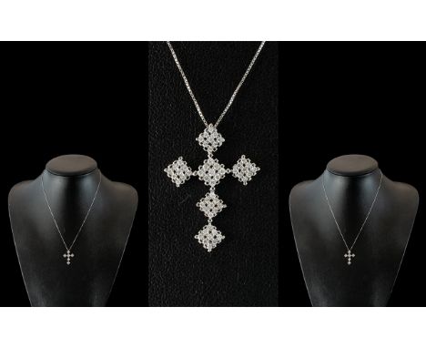 9ct White Gold Diamond Cross, set with 54 round brilliant cut diamonds, suspended on a 9ct white gold box link chain.