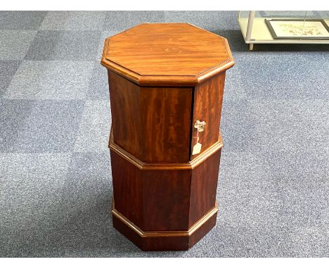 MID-VICTORIAN HEXAGONALMAHOGANY BREAKFRONT POT CUPBOARD the metamorphic upper division with flip-top lid and hinged division 