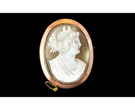 Victorian Period - Attractive Large Shell Cameo Brooch - Mounted In a 9ct Rose Gold Mount with Safety Chain. Marked 9ct and S