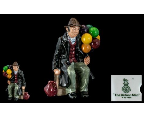 Royal Doulton Hand Painted Ceramic Figure ' The Balloon Man ' HN1954. Designer L. Harradine. Issued 1940. Height 18.4 cms - 7