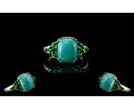 Amazonite and Russian Chrome Diopside Ring, a 3.5ct cushion cut cabochon of Peruvian amazonite, set between triangular should