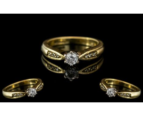 Ladies 18ct Gold Attractive Single Stone Diamond Set Ring. Marked 18ct to Interior of Shank. The Round Brilliant Cut Diamonds