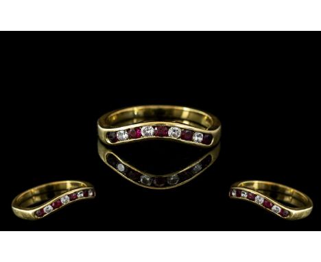 Ladies 18ct Gold Ruby and Diamond Set Dress Ring. Hallmark for 18ct - 750 to Interior of Shank. Rubies and Diamonds of Good C