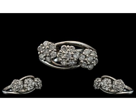 Ladies 18ct White Gold Attractive Triple Cluster Diamond Set Ring, the diamonds being well matched, the ring hallmarked for 7