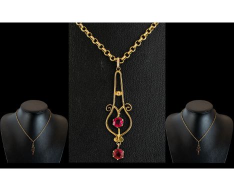 Antique Period - Attractive 9ct Gold Ruby Set Pendant, Attached to a 9ct Gold Belcher Chain. The Two Rubies of Orange / Red C