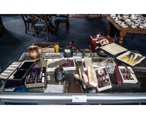 Collection of Assorted Metalware, and boxed plated ware, comprising butter knives, vanity nail sets, grapefruit spoons, soup 