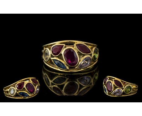 18ct Yellow Gold Multi-Stone Gem Set Ring. Set with Rubies / Peridot and Sapphires, All of Good Colour. Marked 750 - 18ct to 