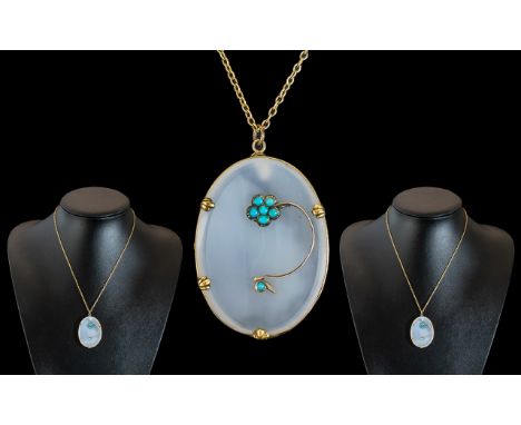 A Victorian Hard Stone Pendant, with mounted turquoise floral decoration, unmarked 9ct gold mount, pendant measures 44 x 30ml