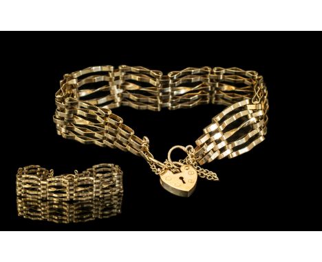 9ct Gold Ladies 5 Gate Bracelet - With Heart Shaped Fastener and Safety Chain. Stamped 9ct. Weight 8.2 grams. Length Approx 6