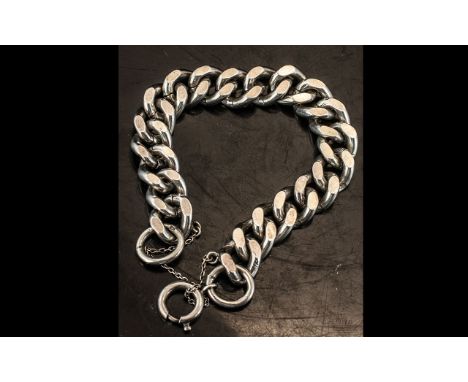 Heavy Link Sterling Silver Bracelet, with safety chain, spring ring fastening, fully hallmarked.  Weight 50.8 grams.