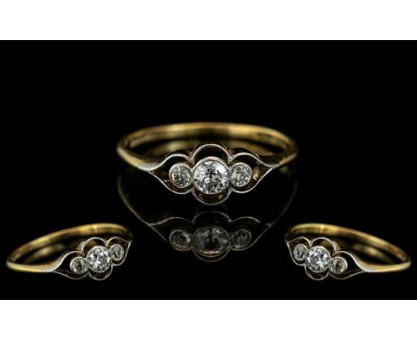 Antique Period 18ct Gold and Platinum Set Ring. Marked 18ct Gold and Platinum to Interior of Shank. The 3 Round Faceted Diamo