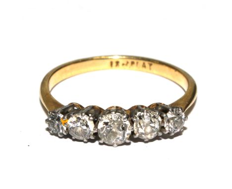 A five stone diamond ring set in 18 carat gold and platinum 